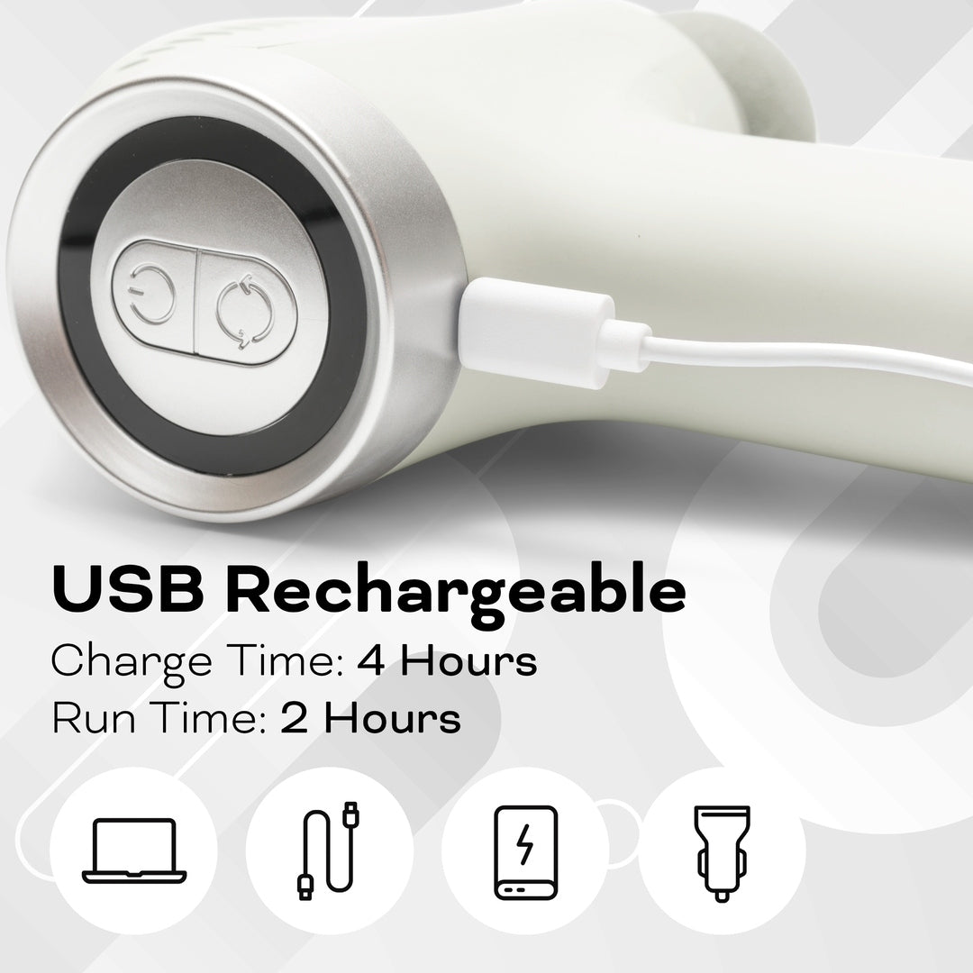 Close-up of the Reviber Deep Tissue Percussion Massage Gun with Long Reach Handle charging via USB. Text: USB Rechargeable—4 hr charge, 2 hr run time. Icons for laptop, plug, phone, and car charger appear below. Brand: Reviber.