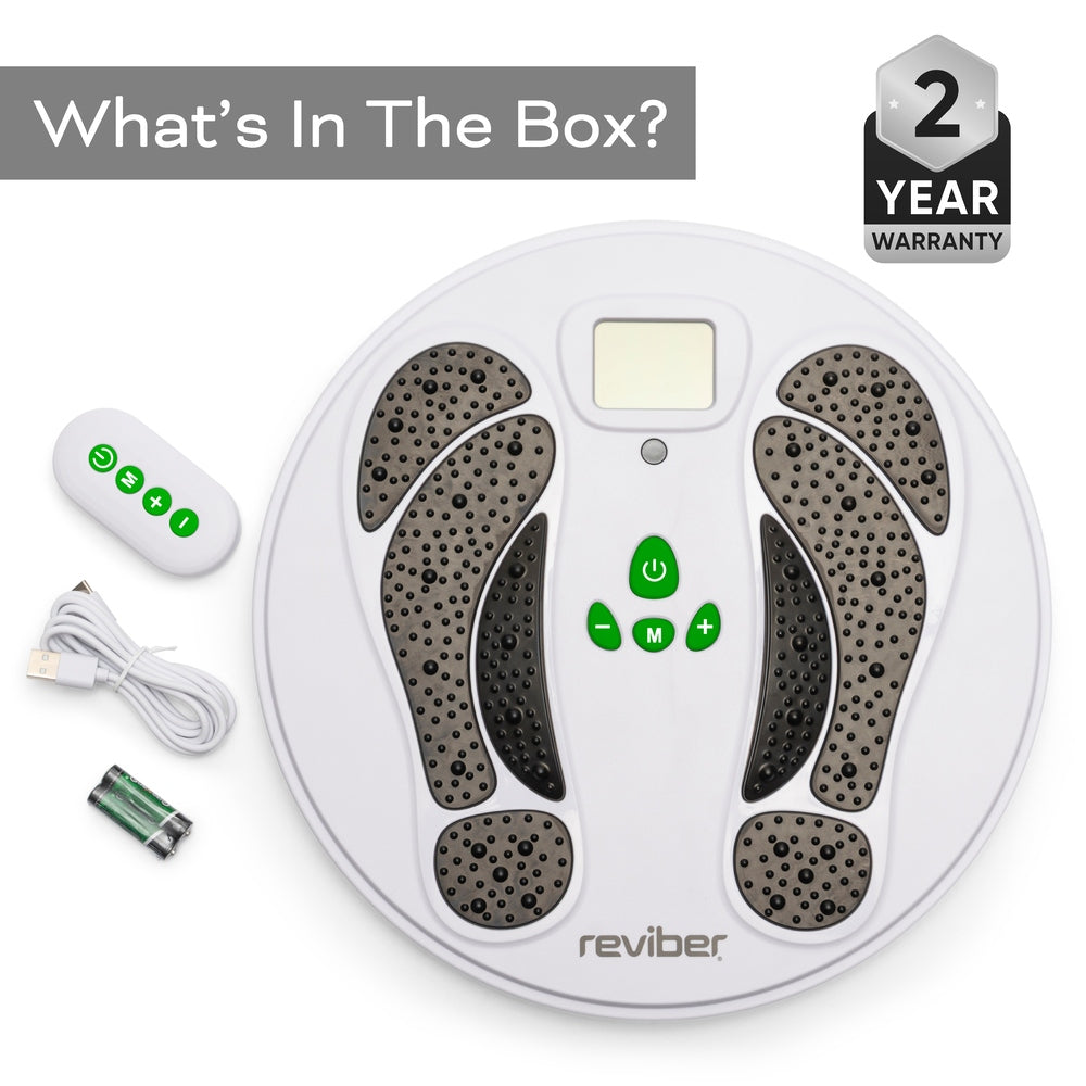 The Reviber Circulation Stim Electronic Muscle Stimulator features foot-shaped pads, a digital display, controls, remote, USB cable, and AA batteries—perfect for recovery and strength. “What’s In The Box?” and “2 Year Warranty” shown in the top corner.