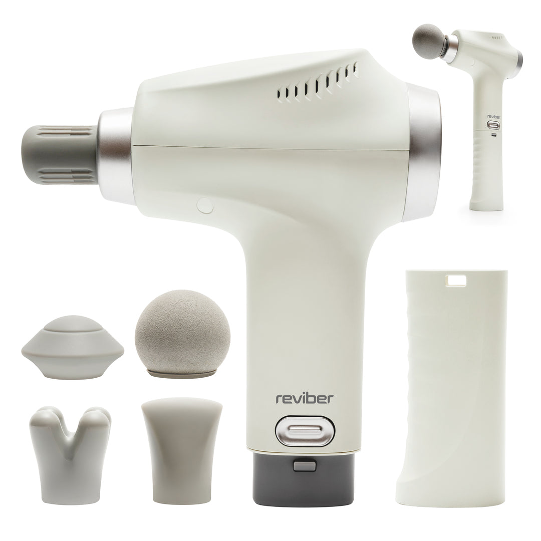 The Reviber Deep Tissue Percussion Massage Gun with Long Reach Handle, shown in white with five interchangeable heads and a removable battery pack, features the “reviber” brand name on its body.
