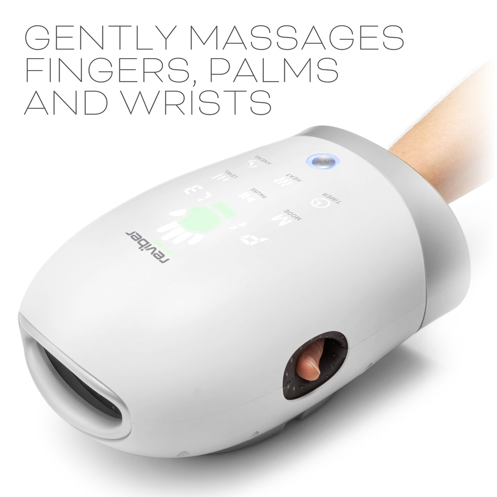 A hand using the Reviber Hand Spa Massager with Heat & Finger Stretch, a white, dome-shaped device from Reviber featuring labeled buttons and adjustable speed; text reads Gently massages fingers, palms and wrists.
