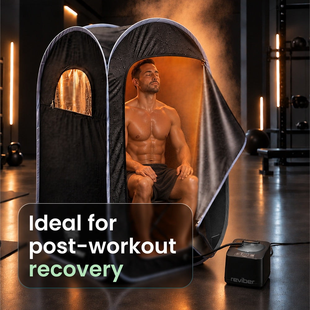 A man relaxes inside a Reviber Steam Sauna Pod, with text overlay reading Ideal for post-workout recovery.