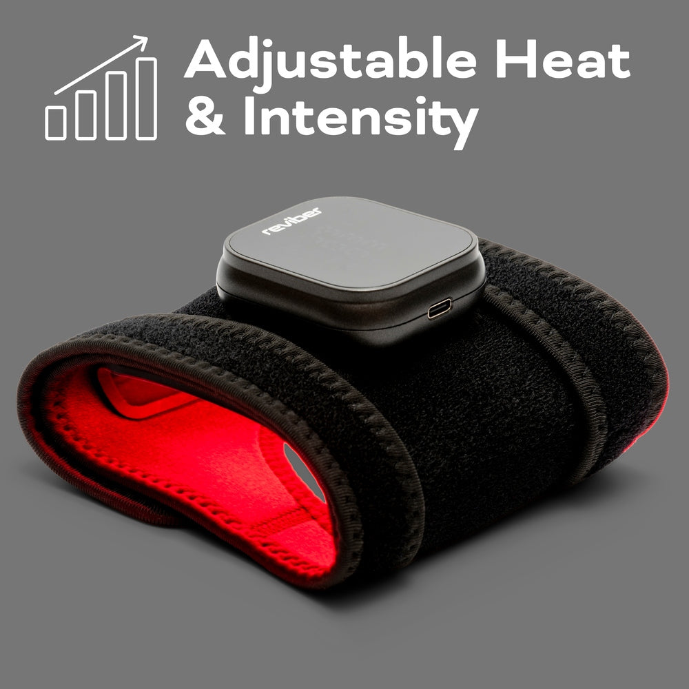The Reviber Infrared Light Therapy Pad by Reviber, a black and red wearable device with a digital control unit, rests on a gray background. “Adjustable Heat & Intensity” appears above, next to rising bars, showcasing targeted pain relief.
