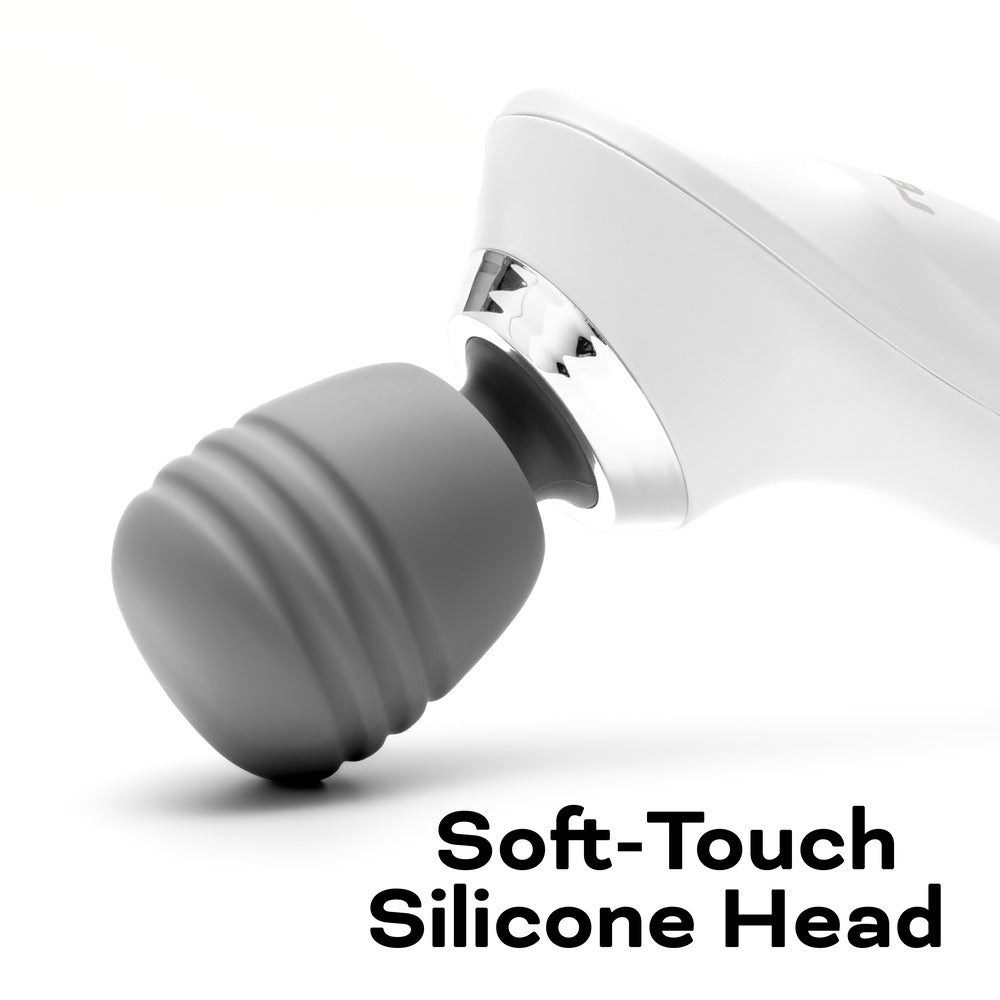 A close-up of the Reviber Hot & Cold Deep Tissue Massager by Reviber, featuring a ribbed, soft-touch silicone head. Perfect for spa-inspired home massage. "Soft-Touch Silicone Head" is written in bold black text at the bottom right.