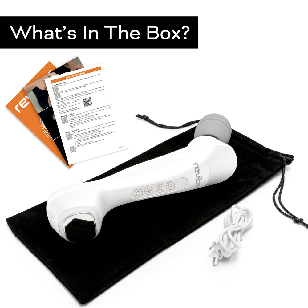 The Reviber Hot & Cold Deep Tissue Massager, black drawstring pouch, charging cable, and user manuals are displayed on a white surface. “What’s In The Box?” Enjoy spa-inspired massage at home with Reviber.