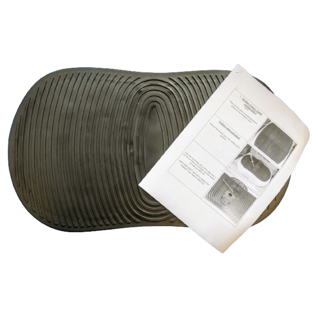A black, oval rubber mat with ridges lies flat. An instruction sheet with installation steps partially rests on the Reviber Fusion replacement platform by Reviber.