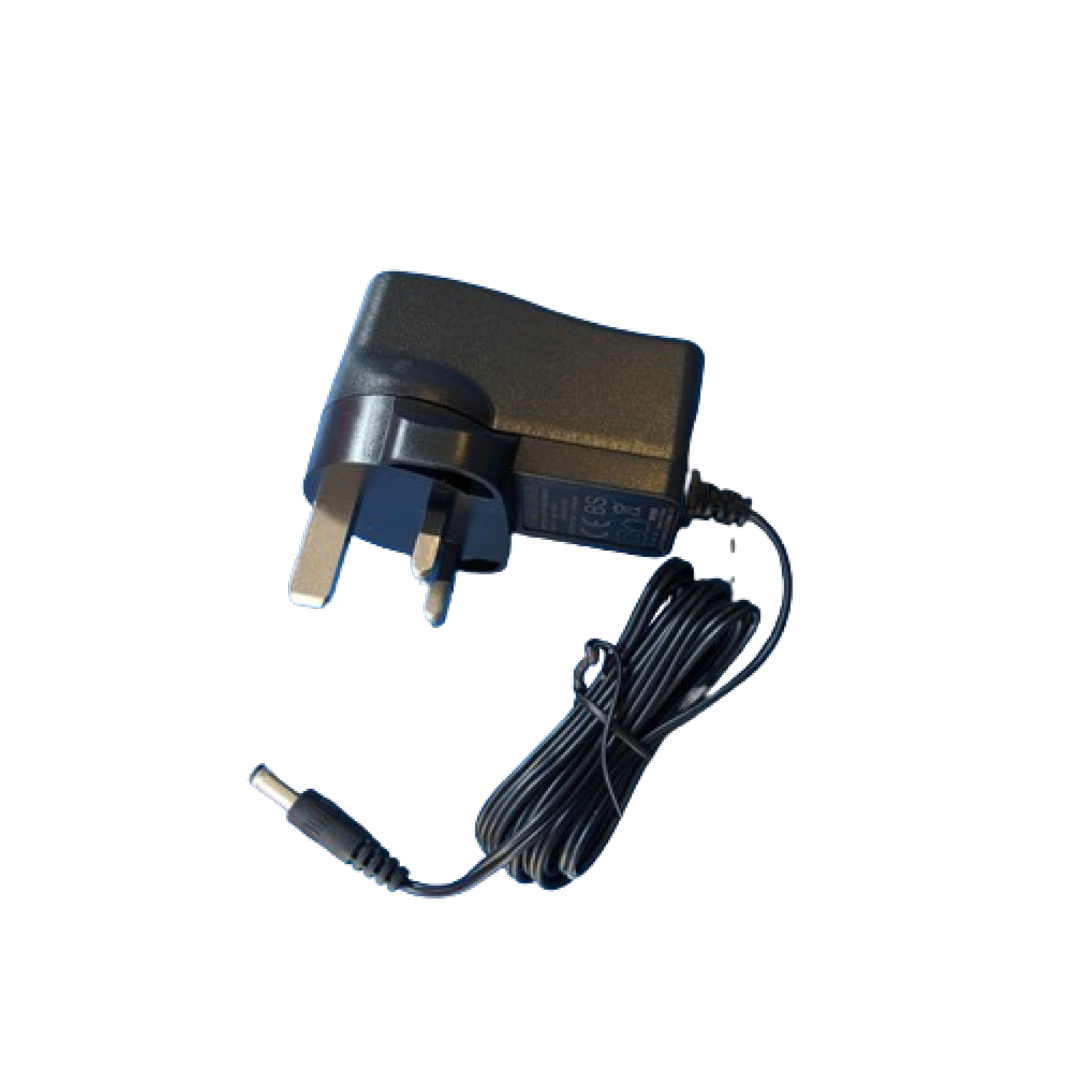 The Reviber Massage Gun Power Lead is a black UK three-pin plug adapter with an attached lead ending in a barrel connector, coiled neatly on a white background; compatible with the RV-MAMG Reviber Massage Gun.